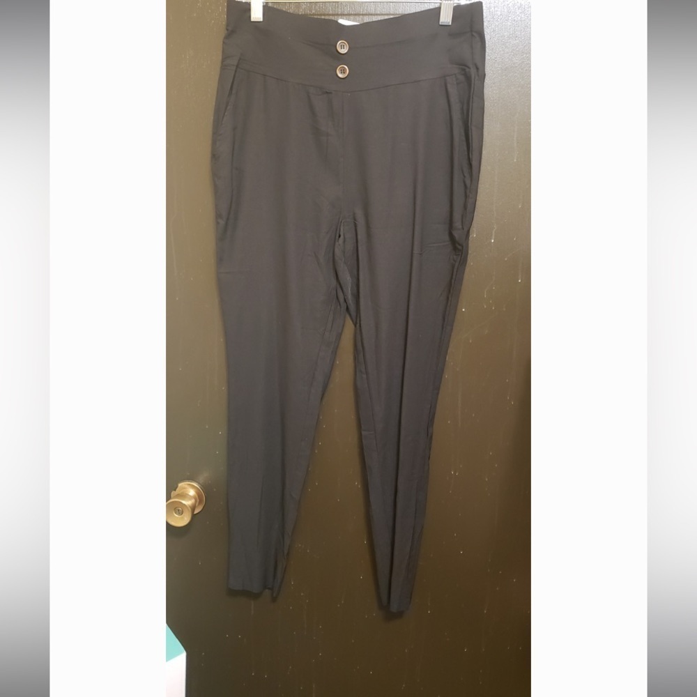 Plus size Black slacks with button accents at the waist. With pockets